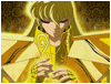 Anime character in golden armor with glowing aura performs ritual hand movements, holding a golden key-like object that transforms into a blue circular symbol.