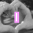 A black-and-white image of hands forming a heart shape with pink text overlays reading 'I', 'LOVE', and 'DENIS' across four