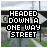 Pixelated image of a road sign reading "HEADED DOWN A ONE WAY STREET" with an arrow, displayed in showing slight variations