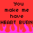 Red background with black pixelated text reading "You make me have HEART BURNHEART BURN" and pink flame-like shapes at the bottom.