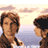 Pixelated static image of two people facing each other against a pastel sky background with soft clouds and gradient colors.