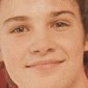 Two side-by-side headshots of a young person with light brown hair and fair skin, followed by two text on blue backgrounds