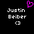 Pixelated text 'Justin Beiber' with heart symbol and '<3' on black background, two identical side-by-side views.