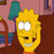 Pixelated yellow cartoon character with spiky hair, wide eyes, and a smiling mouth in an indoor setting.