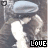repeated pixelated images showing two figures in a close embrace, each with the word "LOVE" below them