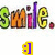 Pixelated text "Smile." in green, orange, pink, purple, and yellow letters with a yellow smiley face below on white background.