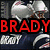 Pixelated image of a football player in silver helmet and dark uniform with red text "BRADY" over top left, blue text "& the" over top right, and red text "PATS!" at bottom center.
