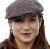 Pixelated static image of a person wearing a gray flat cap with long brown hair, visible against a white background.