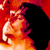 Animated contact sheet showing two frames of a pixelated character with dark hair against red background and CoolBuddy.com text on blue background.