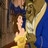 Pixelated static image of two figures in close physical proximity, one with light-colored hair and a yellow garment, the other with darker tones and blue clothing.