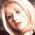 A 50x50 pixel buddy icon split into two sections: a pixelated image of a person with light hair on the left and green text reading "Original Icons .com" on a dark green background on the right.
