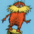 Pixelated orange creature with yellow beard stands on green base against light blue background, text display phrases in colored blocks