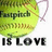 A pixelated green tennis ball with a heart-shaped outline and text reading 'Fergie is Love' in black letters.