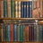 A pixelated image of a bookshelf with books and a statue, next to blue background text reading 'GOT BOOKS?' in white block letters.