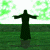 Pixelated image of a dark figure with outstretched arms standing on water under green-tinged sky, next to bright green text reading "Original Icons .com".