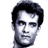 Pixelated grayscale portrait of a man with dark hair and neutral expression on white background.