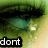A close-up of a green-eyed character with long black eyelashes, showing partial text below the eyes.