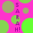 A static image with a bright pink background featuring scattered green and light brown circles, with vertical purple text reading "SARAH!" repeated across the image.