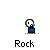 Pixel art character in blue shirt with white skull face, multiple states including speech bubbles and brown rock effects on gray background.