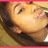 Pixelated close-up of a character's face with closed eyes, light skin tone, and brown hair against a yellow background.