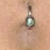 A belly button with a silver-toned navel piercing and text reading "Got to love a piercing" in bold black-and-white lettering.