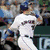 six pixelated images showing a baseball player in various poses, the Mets logo, and text phrases about playing the game