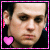 A 50x50 pixel animated contact sheet showing two frames of a buddy icon with a person's face, pink heart symbols, and red ear decorations against a black background.