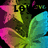Pixelated abstract composition with vibrant pink, green, yellow, and blue hues forming irregular shapes against a black background.