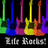 Pixelated image of six colorful electric guitars arranged vertically against a black background with "Life Rocks!" text below.