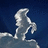 Pixelated image of a rearing horse on dark blue background with white text reading DREAMING ABOUT HORSES.