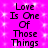 A static image displays the phrase "Love Is One Of Those Things" repeated in a pattern on a pink background with white sparkles