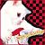 Pixelated static icon showing partial face with red and black checkered pattern on right side, white background, and blurred color transitions.