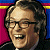 A pixelated contact sheet showing two frames of an animated icon featuring a smiling man with glasses on the left and green text reading "Original Icons .com" on a dark green background on the right.