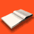 A 3D-rendered open book icon rotates through multiple angles against an orange background, showing pages in various folded states.
