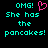 Pixelated cyan text on black background reads "OMG! She has the pancakes!" with a pink heart symbol replacing the 'O' in OMG.