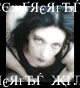 A woman with dark hair and red lips lies on a light surface, her face partially obscured by pixelated text in Cyrillic script.