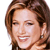 A pixelated close-up of a person with brown hair, closed eyes, and a smiling mouth showing teeth, wearing a small earring.