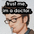 Pixelated image of a person with brown hair and glasses, wearing a dark blue shirt, with overlaid text reading "trust me, m o doctor.".