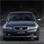 Pixelated front view of a dark-colored sedan with visible headlights, grille, and side mirror against a dark background.