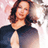 Static 48x48 pixel icon of a person with long brown hair wearing dark clothing against a light pink background, rendered in low-resolution pixel art style.