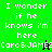 Pixelated text on green and black backgrounds with a small green cursor-like shape moving across the text.