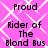 Pixelated text on a pink background with white diamond pattern, displaying 'Proud Rider of The Blond Bus' repeated in four sections.