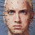 A 50x50 pixel buddy icon featuring a split composition with a pixelated human face on the left and green text on a dark background on the right.