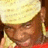 Pixelated image of a person wearing a yellow turban and red clothing with black text reading 'khalil hankins iloveyou' on the right side.