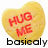 Four heart-shaped yellow candies with red text "HUG ME" arranged in a , each paired with distinct black lowercase words below