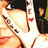 Pixelated close-up of a person with light skin wearing white clothing and dark hair, showing partial facial features including eyes, nose, mouth, and lips.