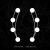 A black-and-white pixelated icon with two vertical columns of six white circles each connected by thin gray lines, forming a symmetrical pattern against a dark background.