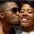 A pixelated image of two people sharing a kiss, with the right person's eyes closed and the left person's eyes open, displayed in a