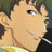 Static 48x48 pixel icon showing a close-up of an anime-style character's face with brown hair and dark eyes, wearing a yellow top against a blurred background.