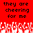 Red background with black pixelated text reading 'they are cheering for me' repeated twice, white pixelated hands raised below.